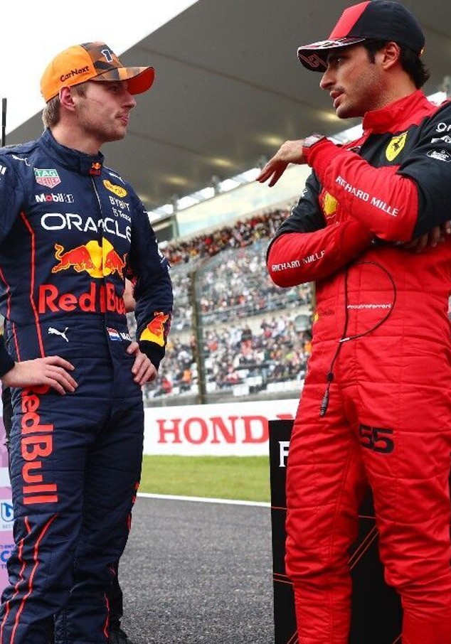 Two formula 1 drivers talking to each other