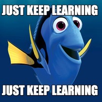 A blue fish with text saying just keep learning