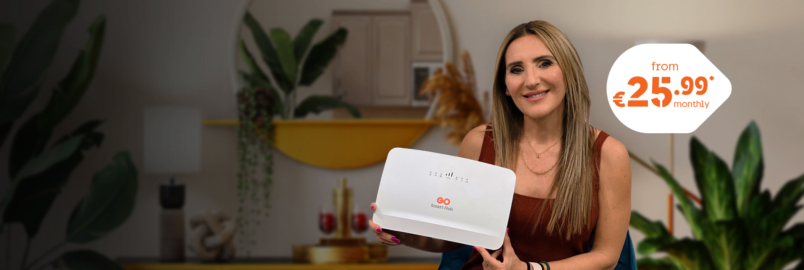 Woman smiling holding an internet device