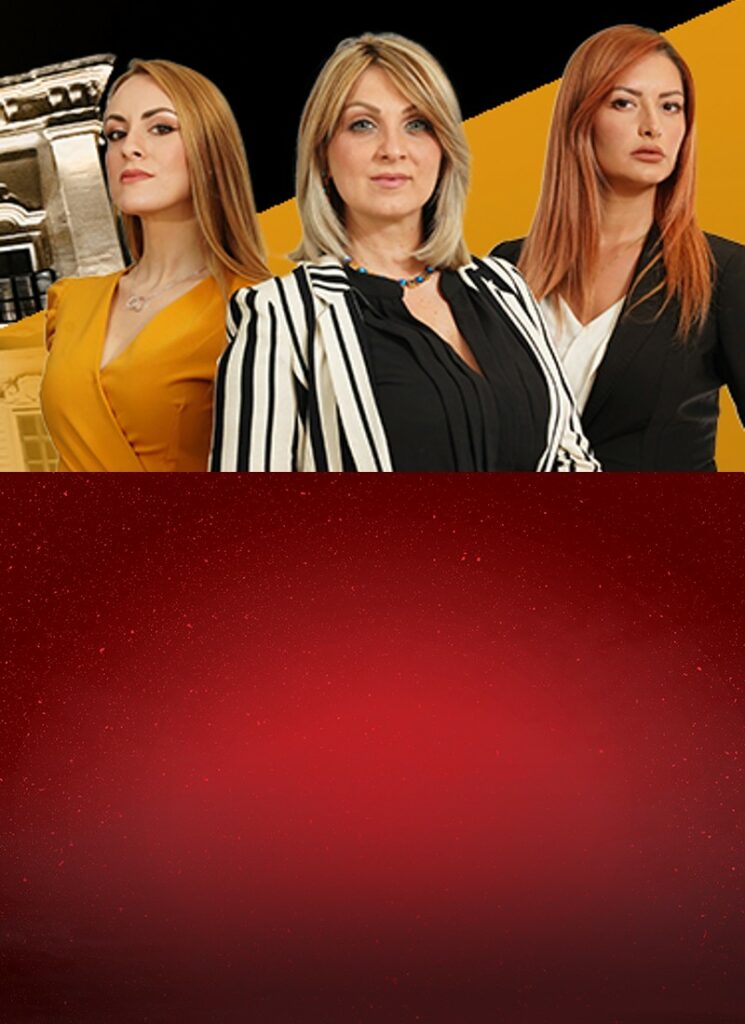 Three women standing looking ahead